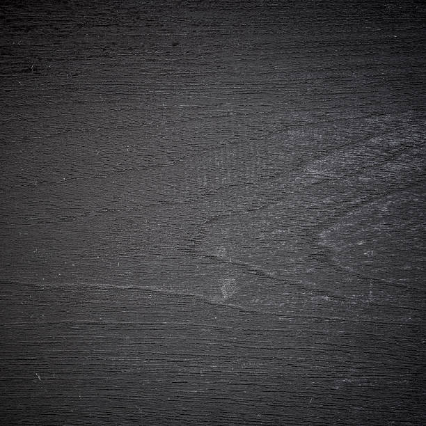istock Black wood plank texture can be use as background 2245621078