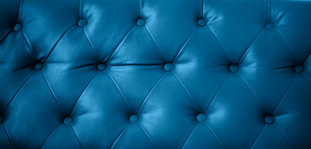 istock Close up texture of dark blue leather sofa retro style can be use as background 2245622543