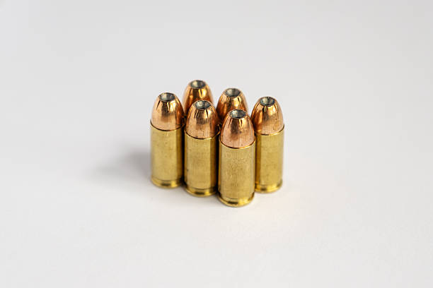 istock Group of Hollow Point Cartridges Standing on White Background 2245627414