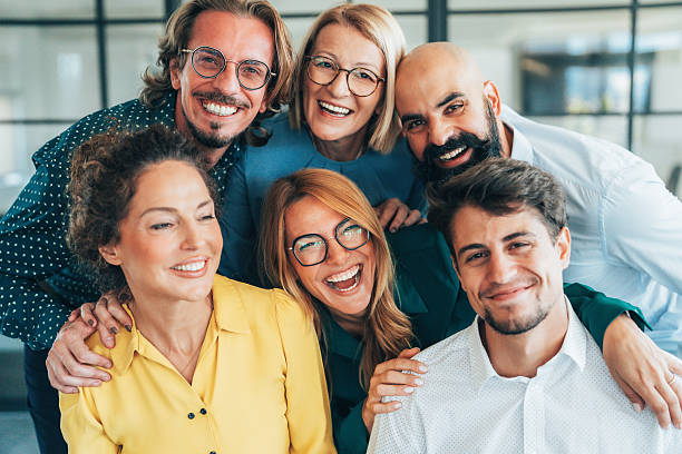 istock Business team embracing after achieving goals 2245627862