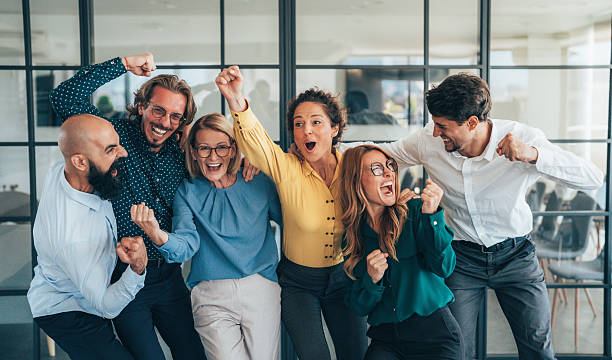 istock Business team celabrating after achieving goals 2245627968