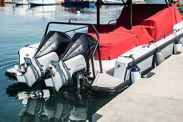 istock Boat Outboard Motors Above Water 2245631231