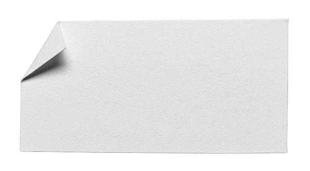 istock Blank paper memo note with folded corner dog-ear earmark and copy space for text isolated on white background 2245635072
