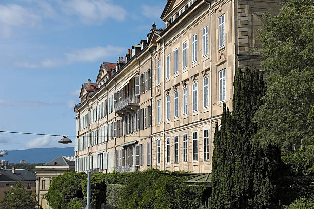 Geneva, Switzerland - September 12, 2025: There are historical edifices in the Old Town District. Here, you can see wonderful facades from an angle other than straight on.