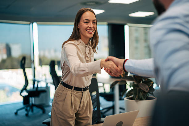 istock Business professionals shaking hands reaching agreement 2245638178