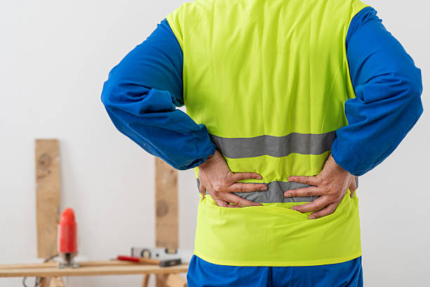 istock Rear view of contractor with sore spine 2245643574