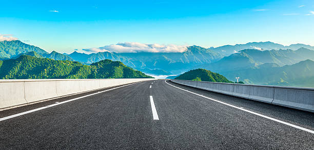 istock Road and mountain natural background 2245644810