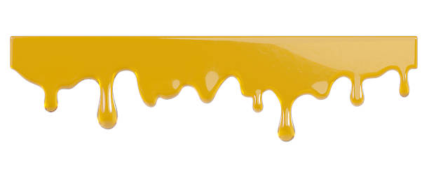 istock Golden Honey melt with glossy drops 2245645758