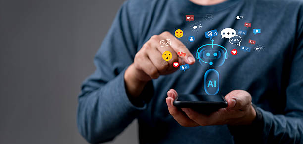 istock AI chatbot technology social media marketing. Hand holding smartphone, customer service automation. Digital engagement, notification, comment, like. Communication, CRM concept. 2245647554