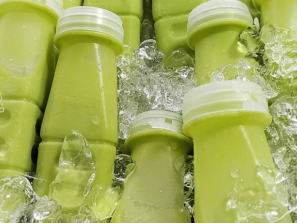 Creamy Avocado Smoothie Bottles chilled on ice
