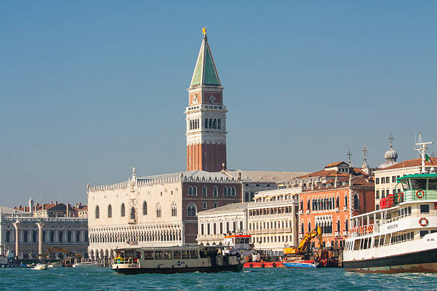Venice, Italy - February 14, 2020: Doge's palace and St. Marco tower from water, Venice, Italy.