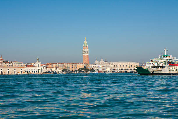 Venice, Italy - February 14, 2020: Doge's palace and St. Marco tower from water, Venice, Italy.