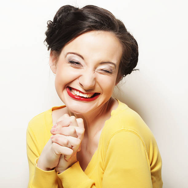 Beautiful young surprised woman. Studio shot