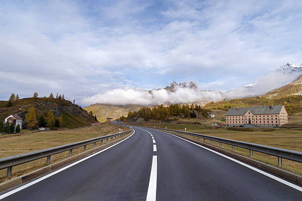 Simplon Pass, Canton Wallis, Switzerland - October 21, 2025: Autumn on the Simplon Pass with Monte-Leone Hotel, the Simplon Hospice behind, Simplon, Valais, Switzerland