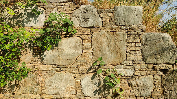 istock Sirsukh wall in Taxila shows arranged stones reflecting Kushan era construction technique 2245663887
