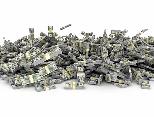 istock Falling bundles of us dollars on white background 2245665287