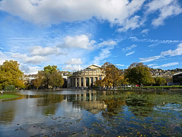 Stuttgart, Germany, October 25, 2025, Stuttgart city downtown lake water reflecting historical opera building with many people enjoying the metropolis