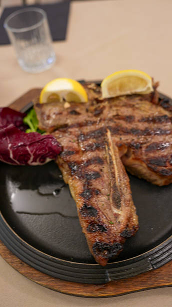 istock Delicious beef steak meal being eaten at fine dining restaurant during evening dinner 2245669658