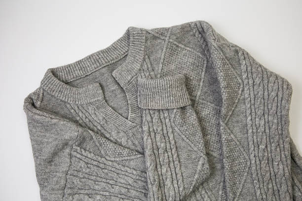 istock Gray Cable Knit Sweater on White Background 2245670743