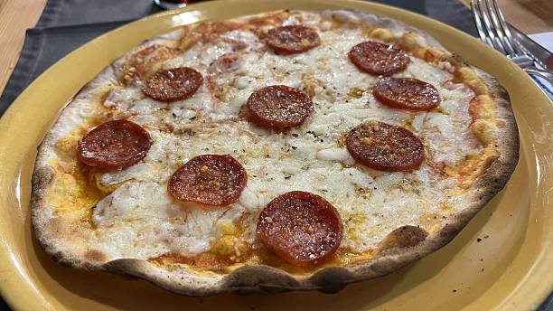 istock Bake homemade pizza hot from oven 2245675081