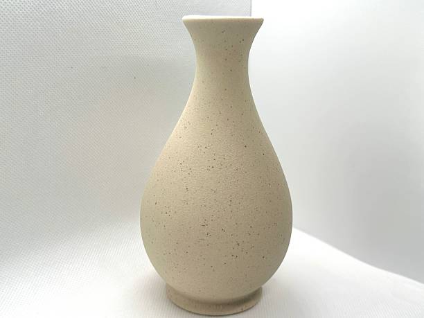 istock Elegant minimalist ceramic vase with smooth surface and gentle curves, perfect for home decor, interior design, and contemporary aesthetics. 2245676180