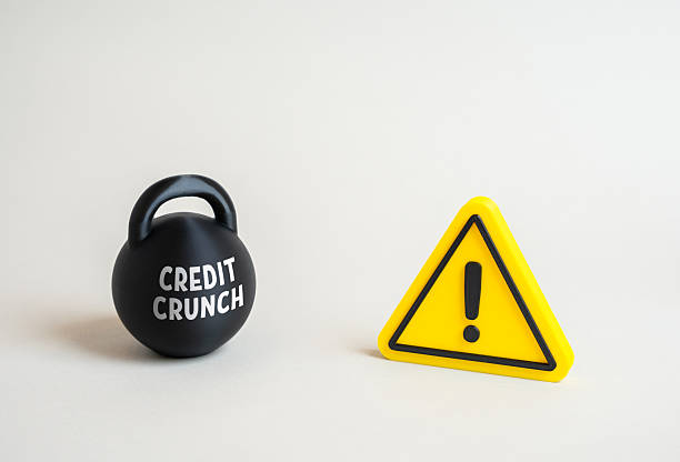 istock Credit crunch threat. Financial warning about economic instability and risk 2245689243