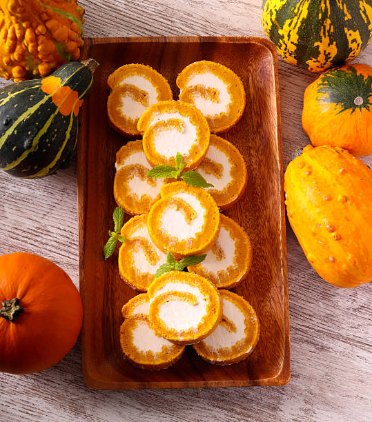 Homemade pumpkin roll with cream cheese filling