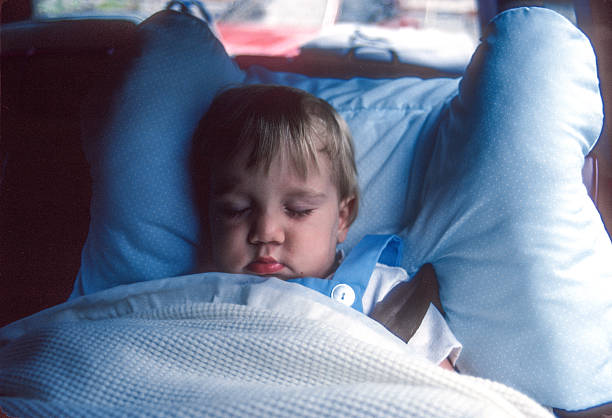 istock North Cascades NP - Boy Asleep in Car - 1989 2245696551