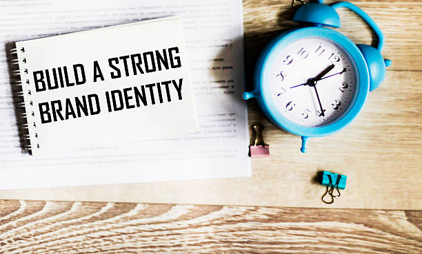 istock There is an inscription on the notebook Build a strong brand identity 2245696775