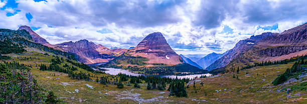 istock Scenic mountain lake landscape with cloudy sky. 2245704270