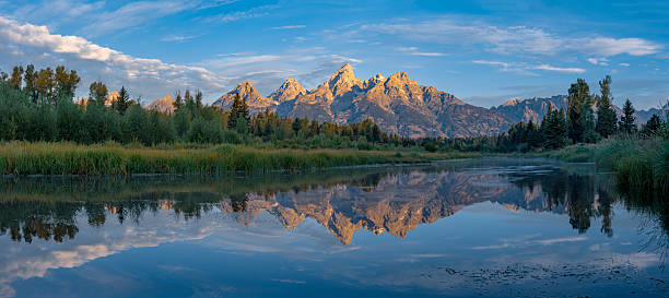 istock Grand Teton peaks reflected in the Snake River. 2245704797
