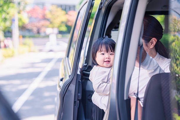 istock Mothers who ride in the car with their babies 2245709741