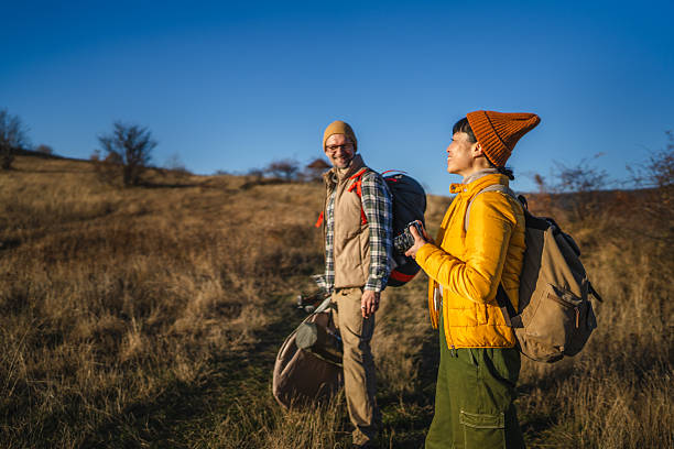 istock Happy couple enjoying hiking and exploring outdoors during autumn 2245709776