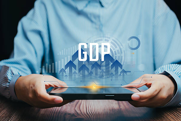 istock Economic growth concept. Businessman analyzing GDP and financial development using digital tablet with data visualization chart showing upward trend in market economy. 2245722862