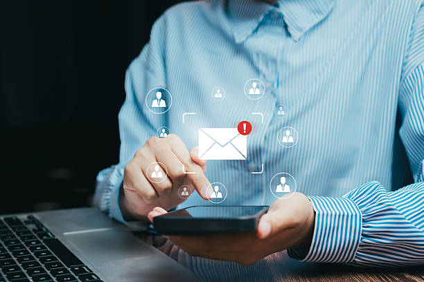 istock Email communication concept. Businessman using smartphone for online messaging, digital connection, and email marketing with notification icon for network communication. 2245722880