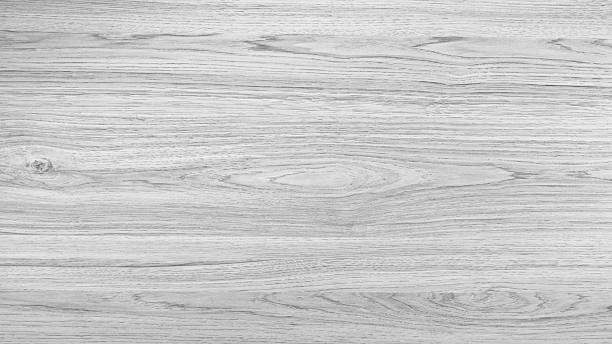 istock White wooden surface with grain texture background. wood looks untreated, without visible paint  varnish. scene is simple and natural, with  background of concept of natural beauty of wood 2245727990