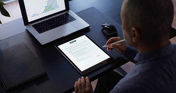 istock Businessman Signing Electronic Contract On Digital Tablet 2245731764