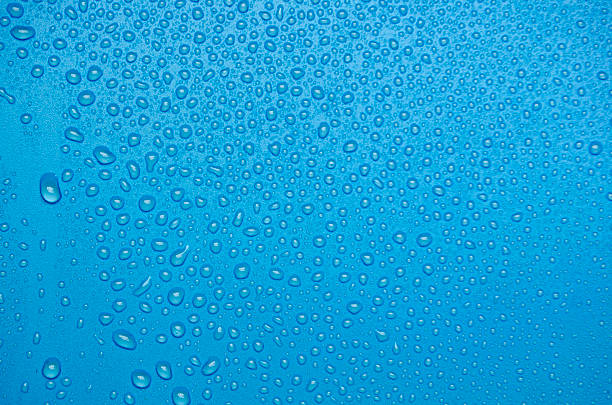 istock Water droplets on ocean blue cover background. Suitable for design and wallpaper. 2245737225