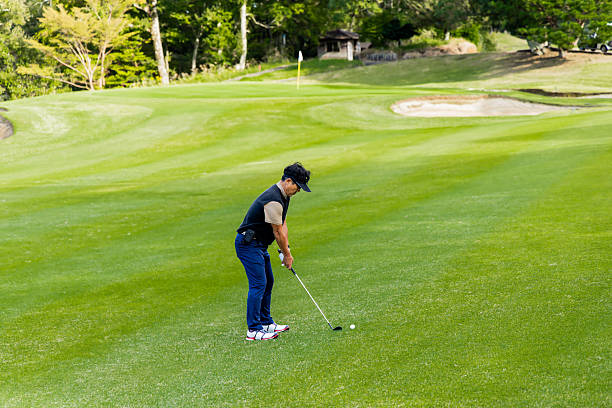 istock A middle-aged Japanese man enjoying golf 2245740118