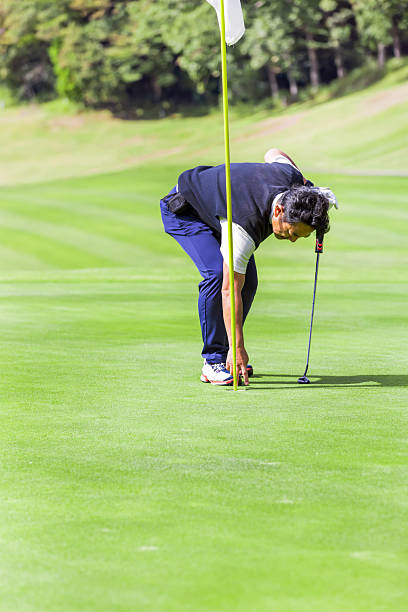 Focus scene on golf activity in golf course