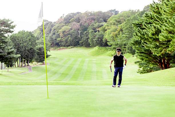istock A middle-aged Japanese man enjoying golf 2245747655