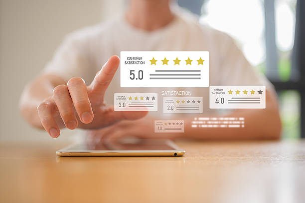 istock Man using tablet to rate online service with five stars and customer feedback, User give rating to service experience online application for Customer review satisfaction feedback survey concept 2245753538