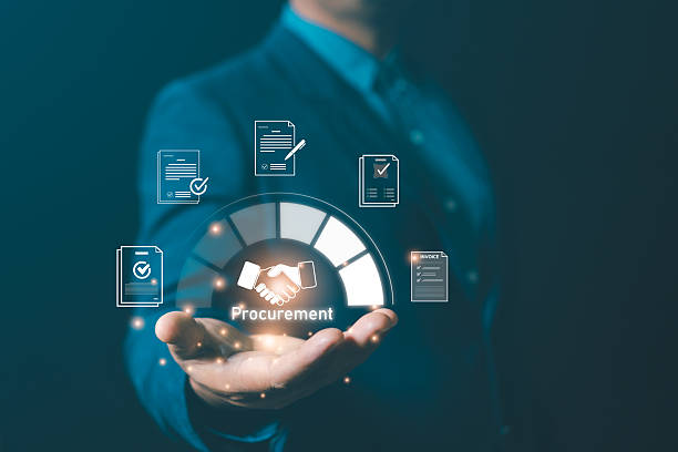 istock Businessman holding digital procurement icon with handshake and document management system, representing contract agreement, supply chain, e-procurement, and corporate business process efficiency. 2245759623