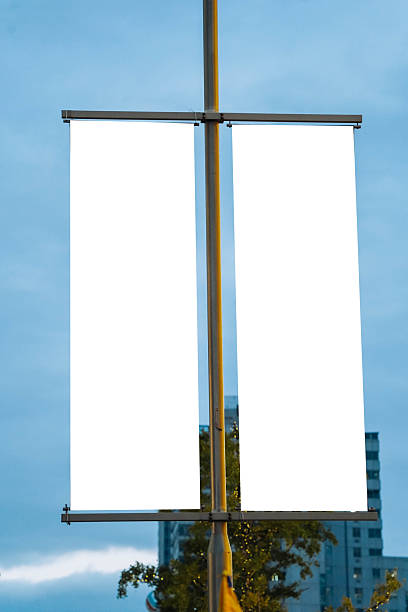 istock Two Large vertical blank billboard on a street wall, banners with space to add your own text, night view 2245763510