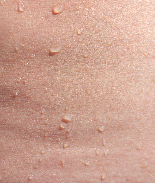 istock A person's back is wet with water 2245782478