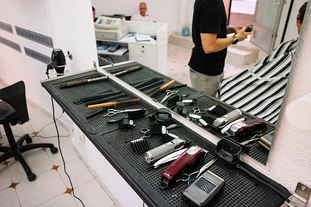 istock Barber tools arranged on workstation in barbershop. 2245783559