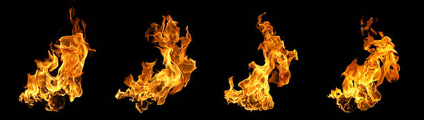 istock Set of realistic orange flames isolated on black background, dynamic fire shapes with bright glow perfect for design, photo compositing, or energy concept artwork. 2245783762
