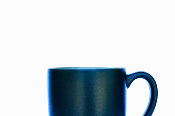 istock A close up of a dark blue ceramic mug on a white background 2245784305