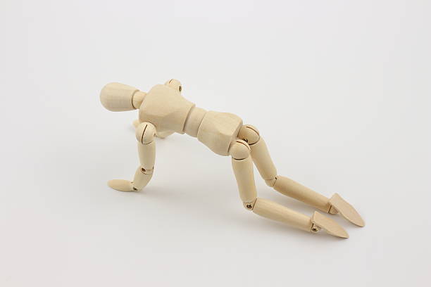 istock A drawing mannequin sinking into feelings of setback and regret. 2245785657
