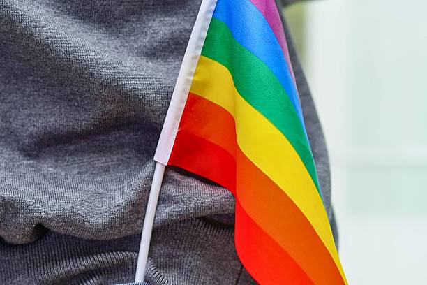 istock Close up of a rainbow pride flag waving 2245786150